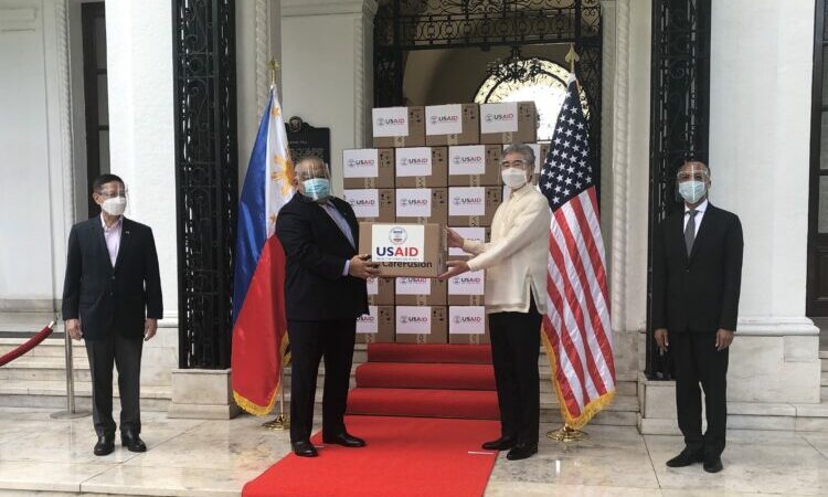 group of people with boxes