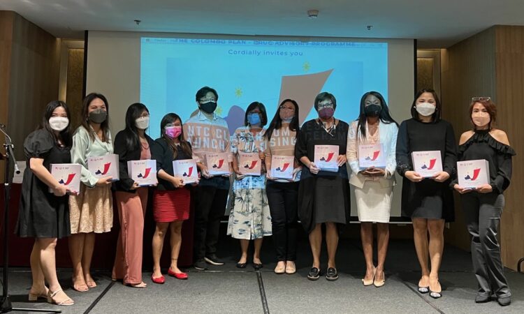 INL Director Kelia Cummins (third from right) joins partners during the launch of a new textbook on the globally recognized Universal Treatment Curriculum for substance use disorder.