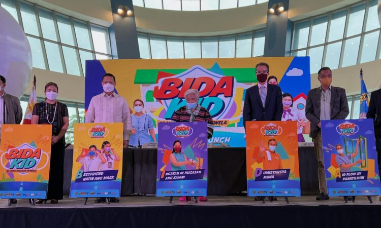 USAID Philippines Mission Director Ryan Washburn (third from right) joins partners from the Department of Education and the Department of Health, led by DepEd Secretary Leonor Briones and DOH Secretary Francisco Duque III, for the launch of the BIDA Kid campaign to support the safe resumption of face-to-face classes.