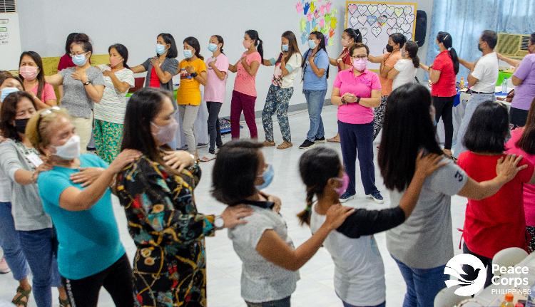 Parents and staff of the Department of Social Welfare and Development’s Pantawid Pamilyang Pilipino Program participate in a developmental activity.