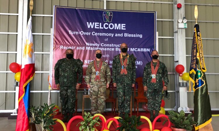U.S. Senior Defense Official to the Philippines and JUSMAG-Philippines Chief Col. Stephen Ma and Philippine Marine Corps Commandant Maj. Gen. Nestor Herico lead the April 9 turnover of an assault boat maintenance bay facility to the PMC in Puerto Princesa.