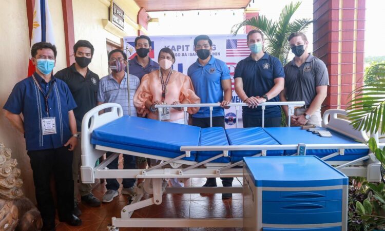 The U.S. Embassy Civil Affairs Team turns over the ICU beds to Batanes provincial officials, led by Governor Marilou Cayco.