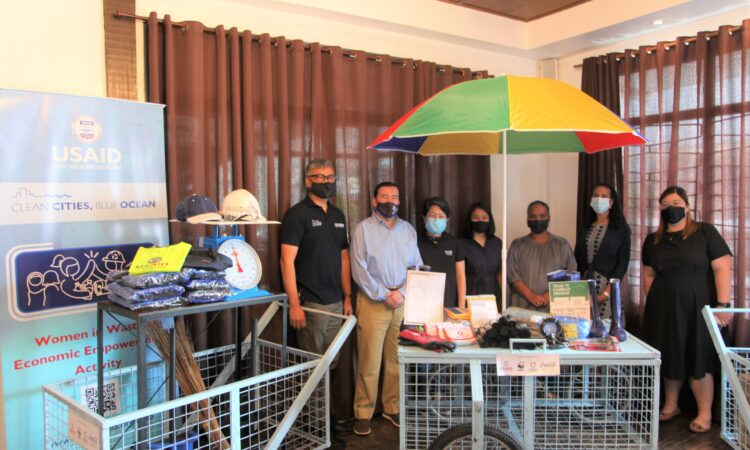 (From left) Philippine Country Director of USAID’s CCBO program Joel Palma, CCBO program Chief of Party Jon Angin, Coca-Cola Foundation Philippines President Ma. Cecilia Alcantara, WWF-Philippines Executive Director Katherine Custodio, USAID beneficiary Riza Santoyo, USAID Deputy Mission Director Rebekah Eubanks, and Quezon City Small Business and Cooperatives Development and Promotions Office OIC Mona Celine Marie Yap during the handover ceremony.