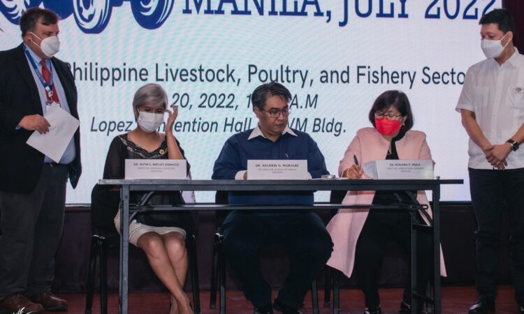 National Livestock Director Dr. Ruth Sonaco, Bureau of Animal Industry OIC-Director Dr. Reildrin Morales, and Agricultural Training Institute Director Dr. Rosana Mula sign the memorandum of understanding on behalf of DA, in the presence of Agriculture Commissioner of Minnesota Thom Petersen representing the University of Minnesota.