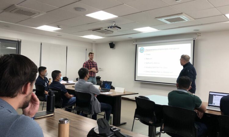 U.S. and Philippine maritime personnel exchange knowledge and best practices to strengthen joint operations at sea. Credit: CACI.