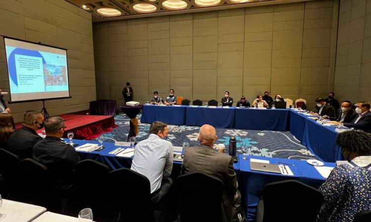 DTRA representatives and members of various government agencies discuss the creation of a national training center to support national security and the environment.