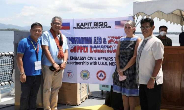 (From left) Kalayaan Municipal Disaster Risk Reduction and Management Officer Dennis Abacial, Palawan Governor Socrates, U.S. Embassy Acting Public Affairs Officer Lewis, and Provincial Legal Officer Atty. Joshua Bolusa attend the turnover ceremony of U.S.-donated tents and supplies to augment the Palawan local government’s shelter, medical, and logistical capacity during crises.