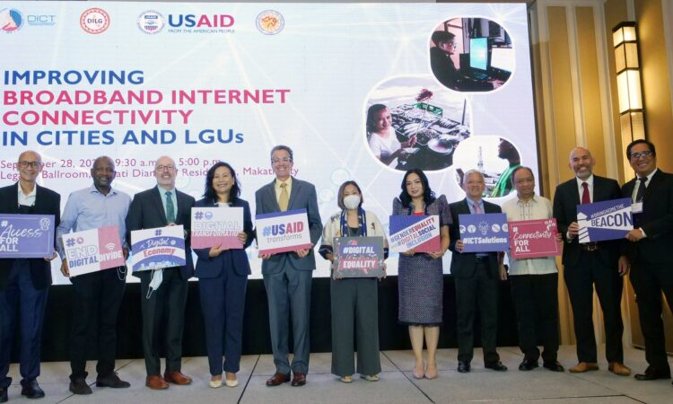 USAID Philippines Mission Director Ryan Washburn (fifth from left), DICT Assistant Secretary Philip Varilla (leftmost), Assistant Secretary Maria Teresa Camba (fourth from left), Makati City Mayor Abby Binay (center), and Tagbilaran City Mayor Jane Yap join other U.S. government representatives in reiterating their support to enhance digital connectivity in the Philippines.