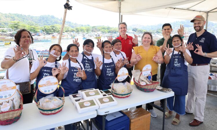 USAID Deputy Assistant Administrator Sara Borodin (fourth from right), Mission Director Ryan Washburn (fifth from right), and other USAID representatives met representatives from a USAID-supported fishing association in Subic.