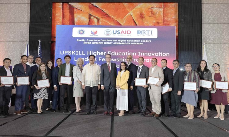 USAID Philippines Mission Director Ryan Washburn and Commission on Higher Education (CHED) Chairman J. Prospero De Vera III pose with the first batch of fellows of the USAID UPSKILL Higher Education Innovation Leaders Fellowship Program, composed of 16 higher education officials from across the Philippines who will participate in an 8-month learning program focused on innovation.