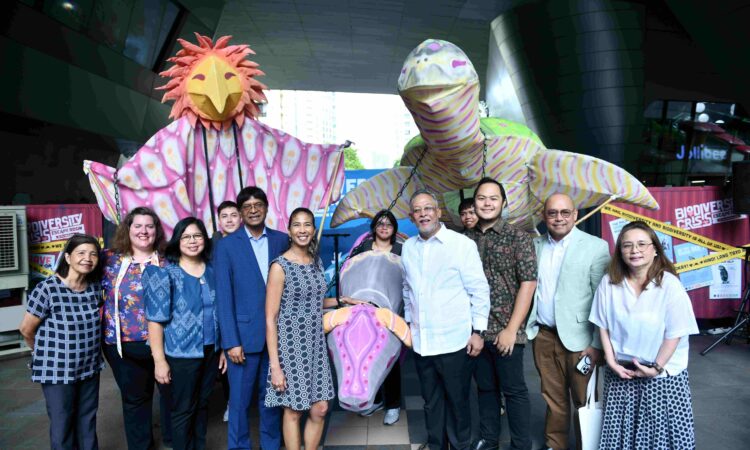 USAID Philippines Deputy Mission Director Rebekah Eubanks (center left), Department of Environment and Natural Resources (DENR) Undersecretary for Legal and Administration Ernesto Adobo Jr. (center right), Bonifacio Art Foundation Managing Director Maribel Garcia (extreme right) join environment partners at the launch of the new “Biodiversity Crisis Escape Room” at The Mind Museum in Taguig City.