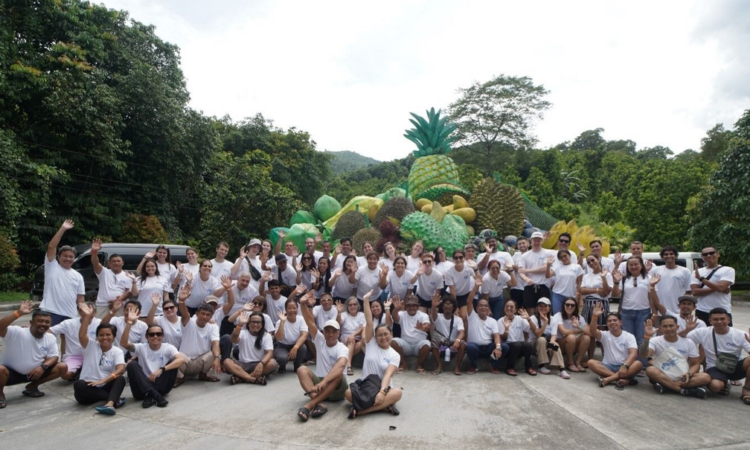United States Peace Corps staff pose with 60 participants of the Enhancing Marine Protected Area Management training workshop in Puerto Galera, Oriental Mindoro.