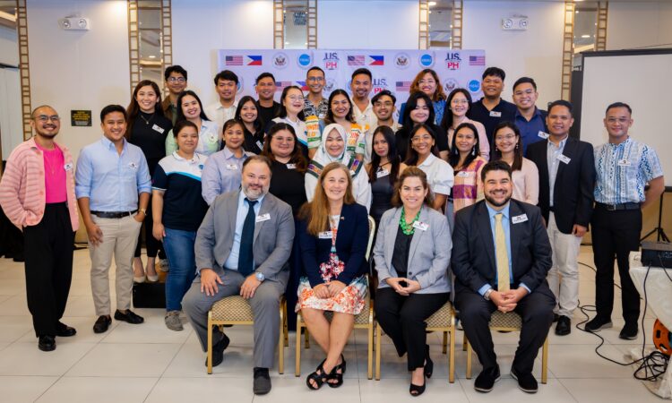 Departing YSEALI fellows pose for a group photo with U.S. Embassy in the Philippines Officers at a restaurant in Manila.