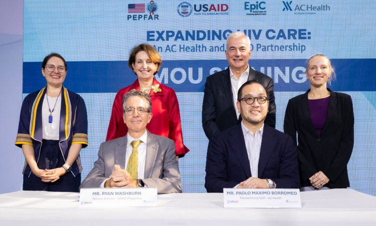 USAID Philippines Mission Director Ryan Washburn (seated left) and AC Health President and CEO Paolo Borromeo (seated right) are joined by (standing from left) USAID Philippines Office of Health Director Andrea Halverson, U.S. Ambassador to the Philippines MaryKay Carlson, AC Health Chairman Fernando Zobel de Ayala, and USAID Philippines Office of Health Deputy Director Tracy Hawry during the November 26 launch of a partnership between USAID and AC Health to expand the accessibility of HIV services in the Philippines.