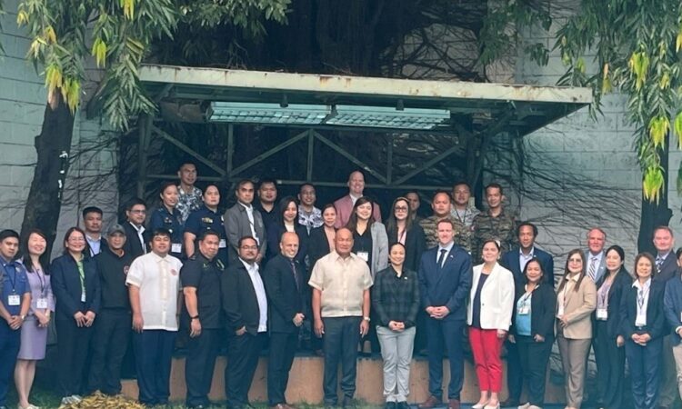 Philippine Anti-Terrorism Council-Program Management Center (ATC-PMC) representative Director Jose S. Embang, Jr. (center) and Defense Threat Reduction Agency (DTRA) International Counterproliferation Program representatives Major Matthew Fecke (7th from right), Master Sergeant Dazzle Orbeta (8th from right) and Nicholas J. DeDominici (9th from left) join participants at the Targeting and Risk Management Workshop from March 24 to 28.