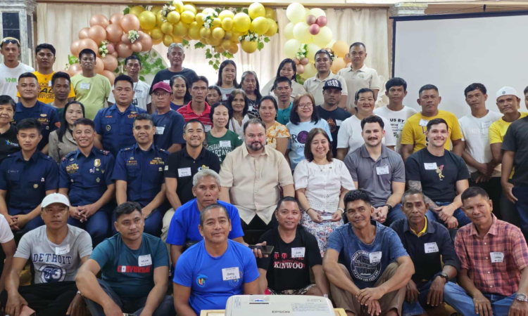 A fisherman raises a concern with a Philippine Coast Guard officer during one of the workshops.