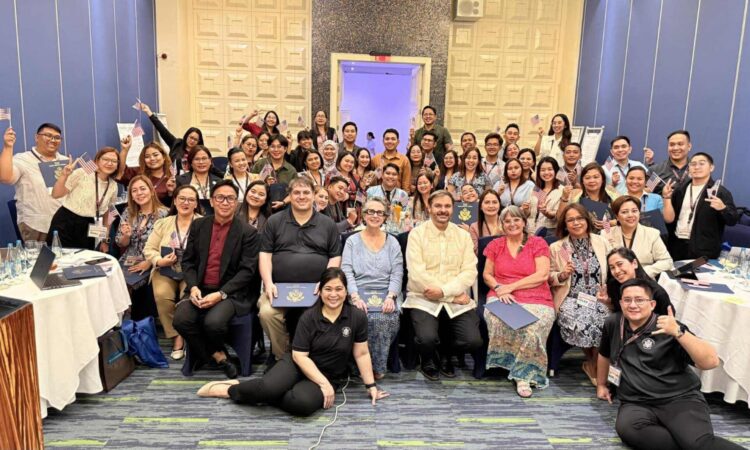U.S. Embassy Regional English Language Officer Jeff McIlvenna and English Language Fellows Laura Roach, Maryann Miller, and Michael Schapiro (seated) join 48 Filipino teachers at “The Educator’s Edge: Mastering Literacy, AI, and Critical Thought" workshop organized by the U.S. Embassy in Mactan, Cebu, on September 26.